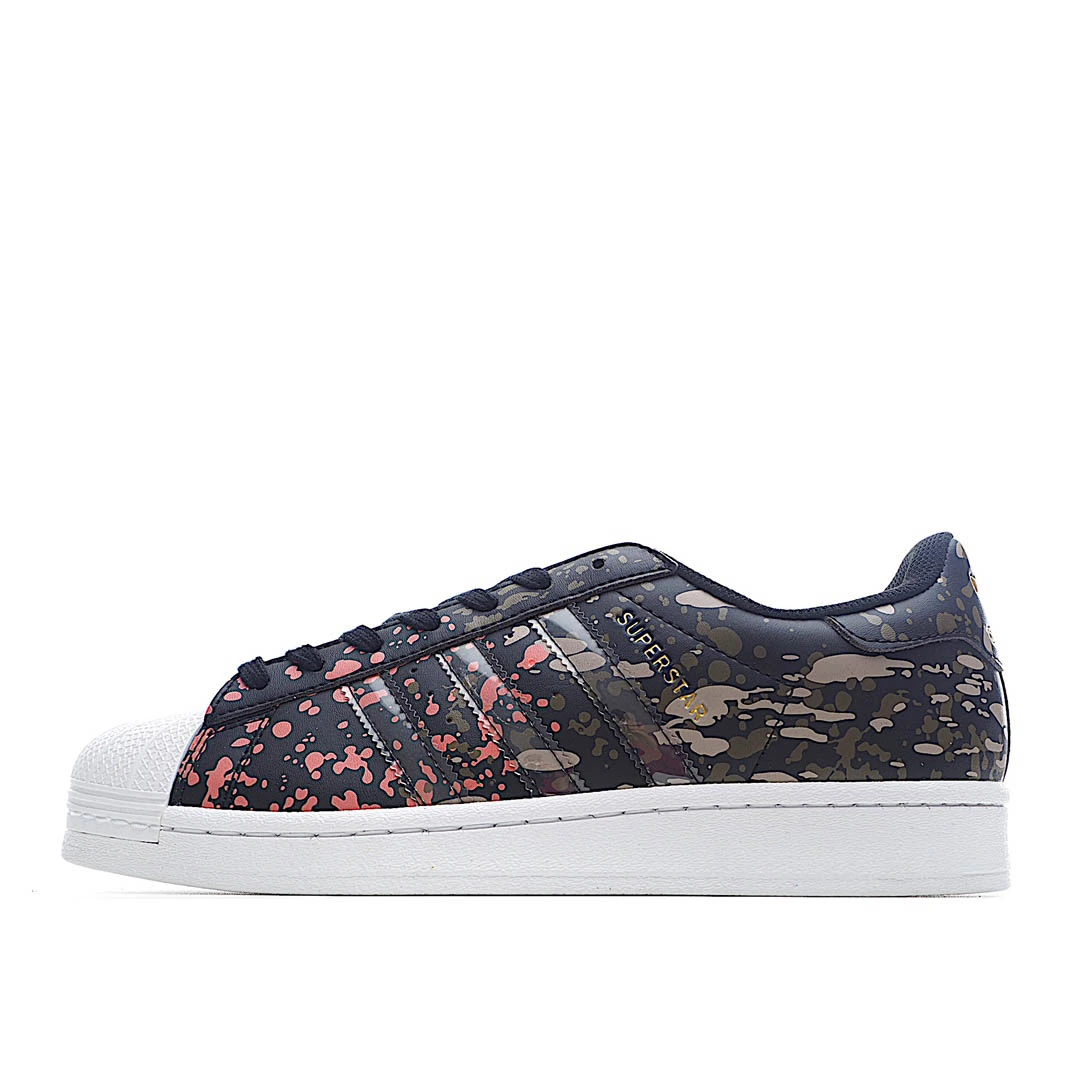 i5fd4137c8c3e9ca58b764f3fc16621ed.webp Adidas Superstar ‘Splashes. Splatter and Drips - Black - Image 1