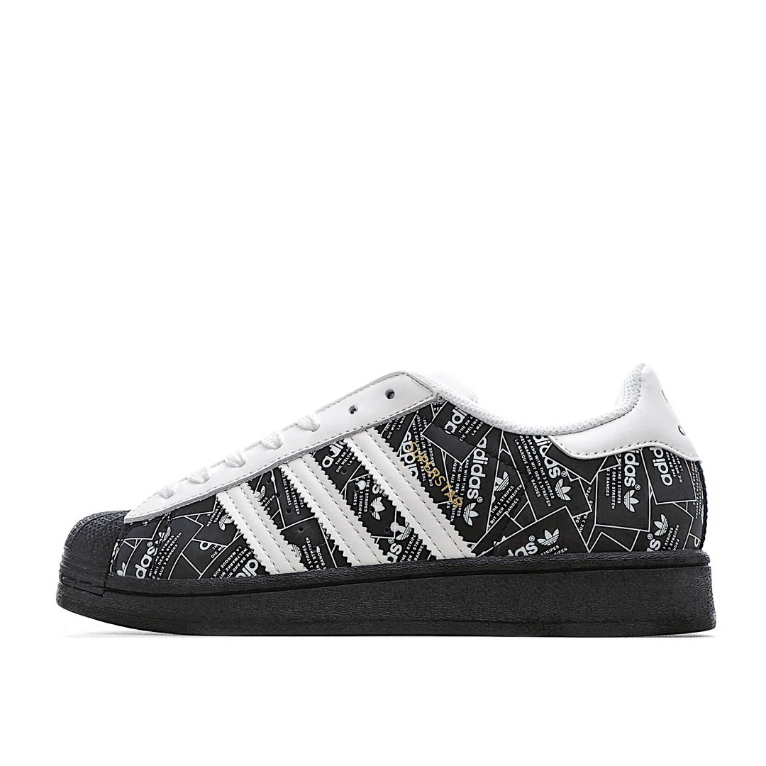 i988eeb1575956d83ed756f56c60244d4.webp Adidas Superstar ‘All Over Print - Black- - Image 1